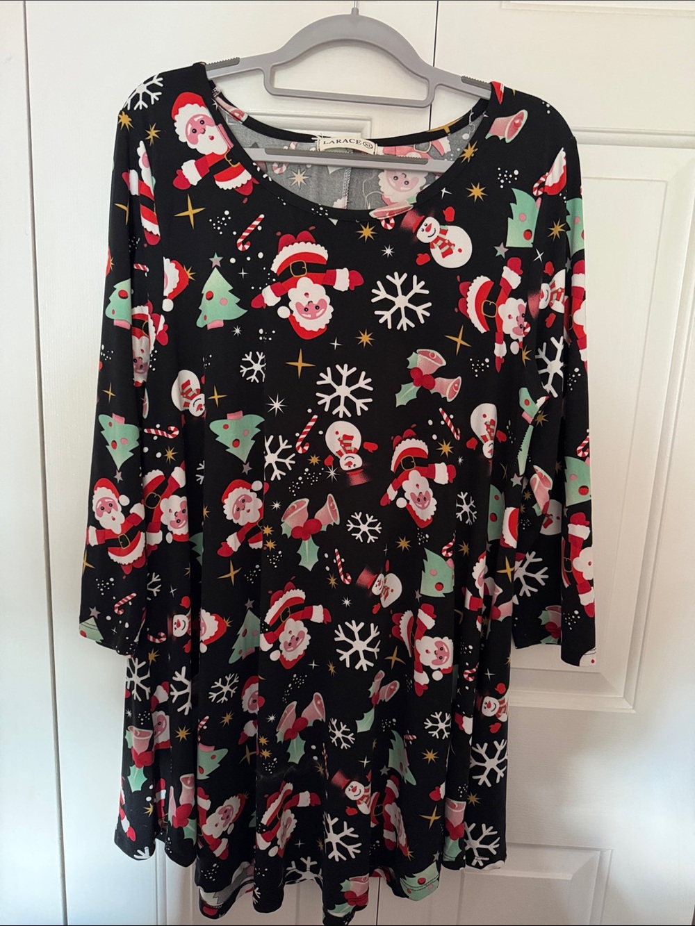 Lularoe Floral & Dot Swing Top by LARACE?